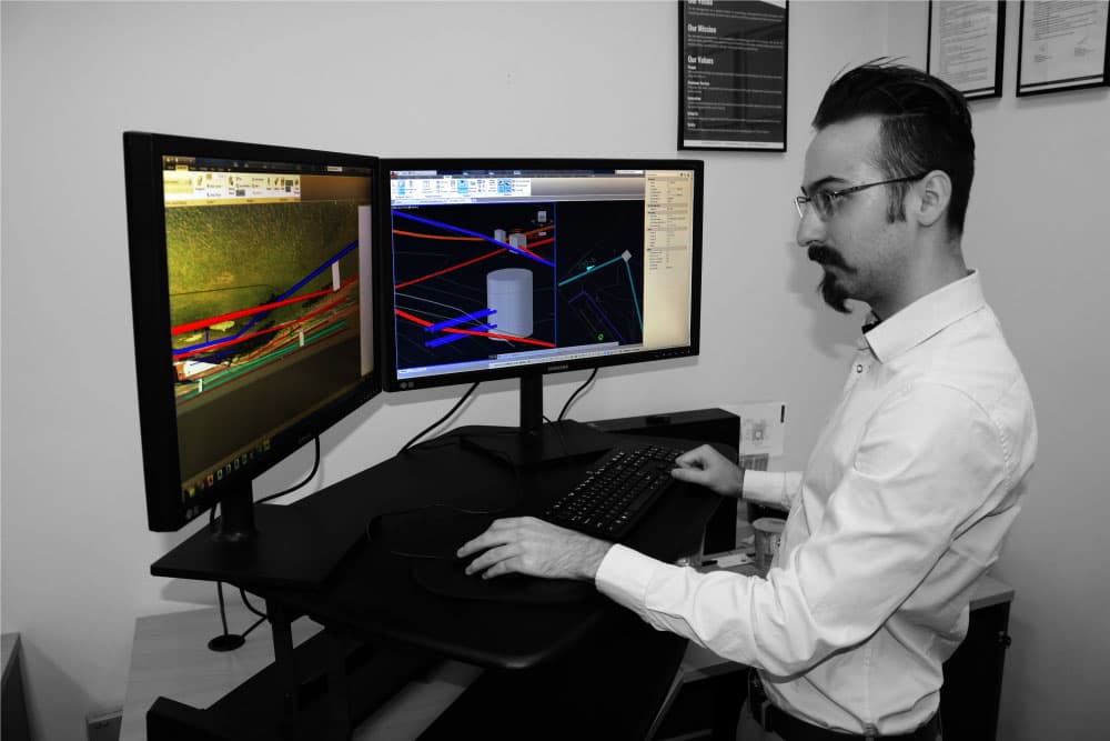 USL-1 technician marking utility locations on a jobsite